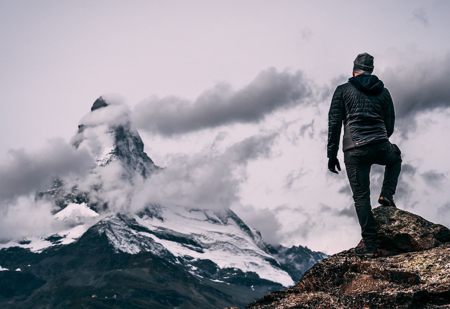 Climber looking at the mountains